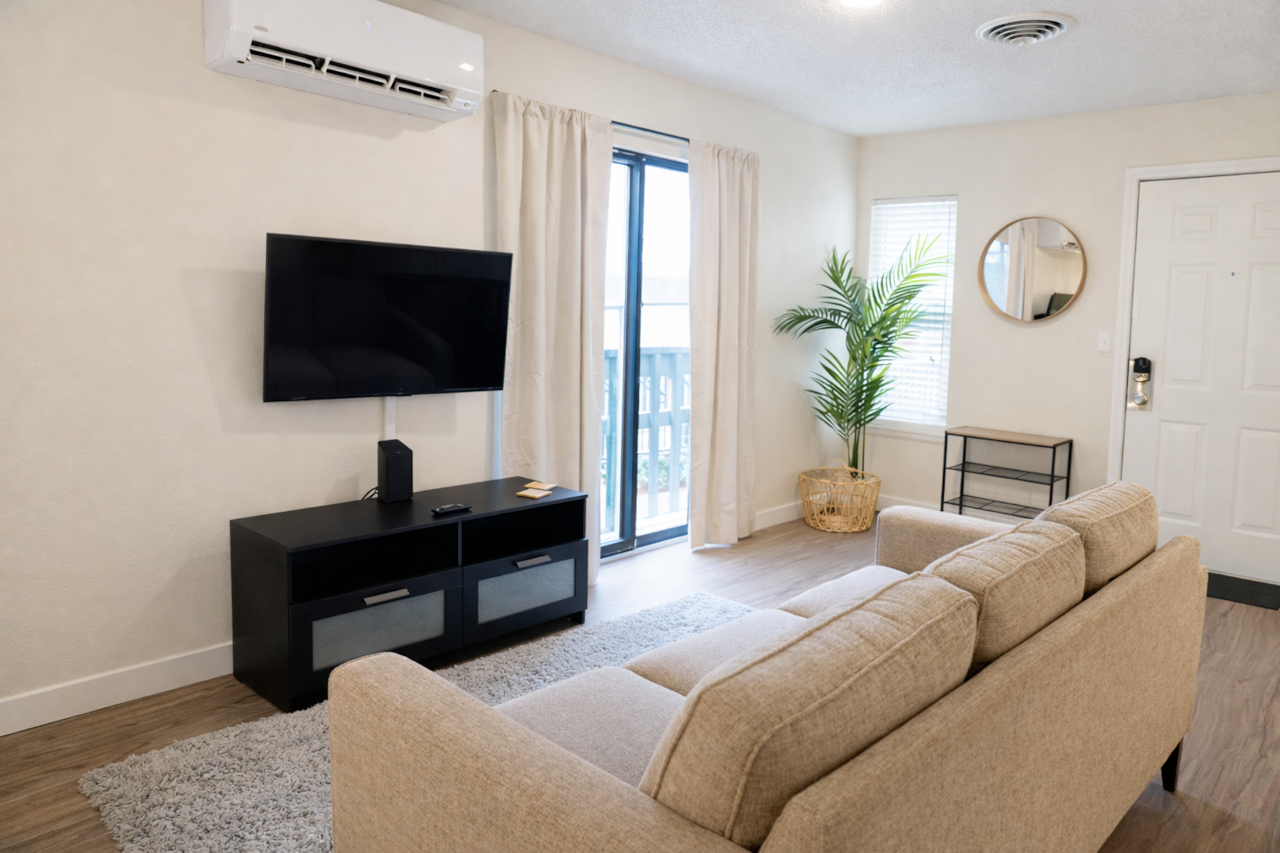 Comfortable living area featuring a Smart TV for effortless streaming and entertainment