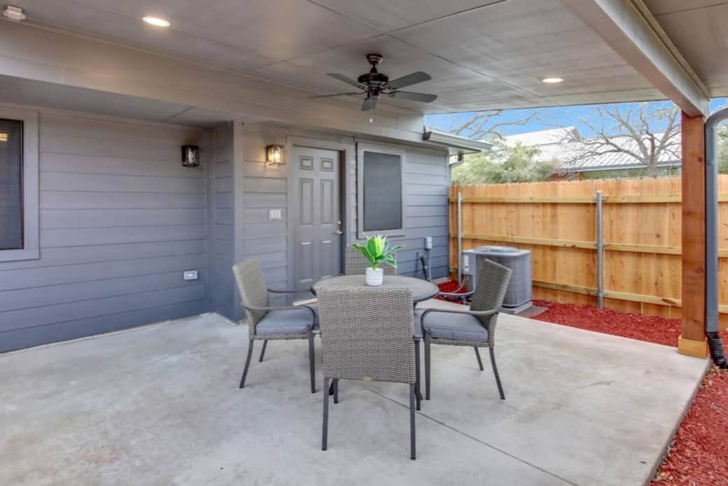 Relax in the private, covered back patio area. Relax in the private, covered back patio area.