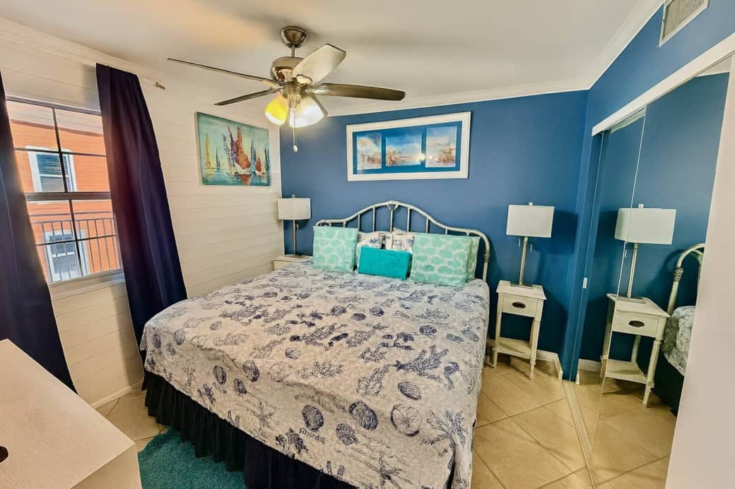 Comfortable king bed with dresser, TV and closet space