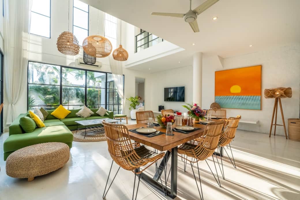 Our bright and airy living space is perfect for hanging out — whether it’s family meals, game nights, or just lounging with a good book and a view of the pool.