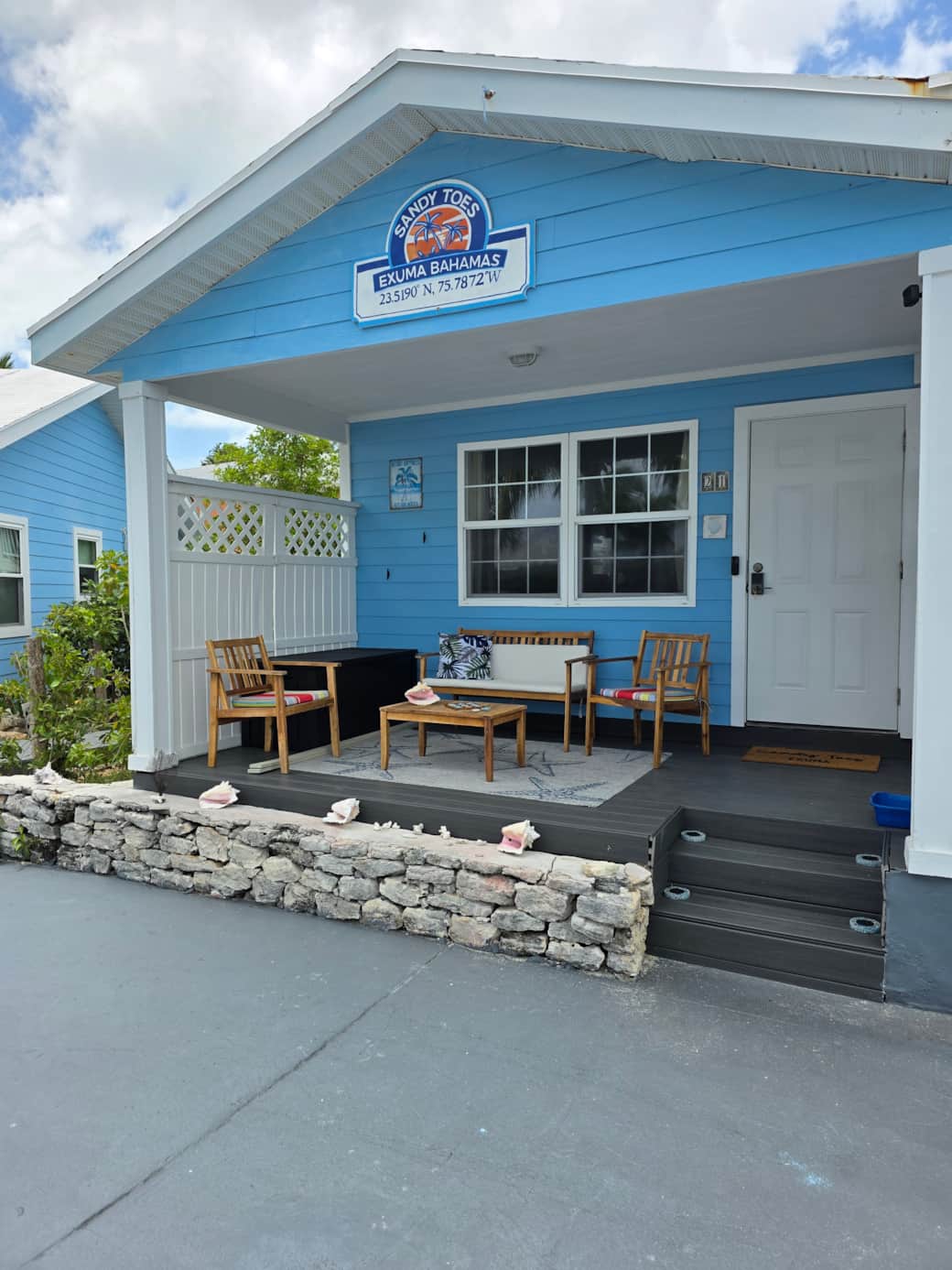 our front porch with a beach toy box in the corner our front porch with a beach toy box in the corner