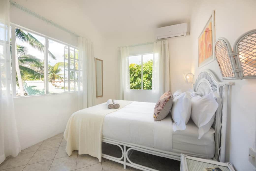 Bedroom with a queen bed Bedroom with a queen bed