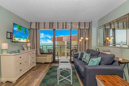 Updated living room with Penthouse Ocean views and Smart Roku TV!