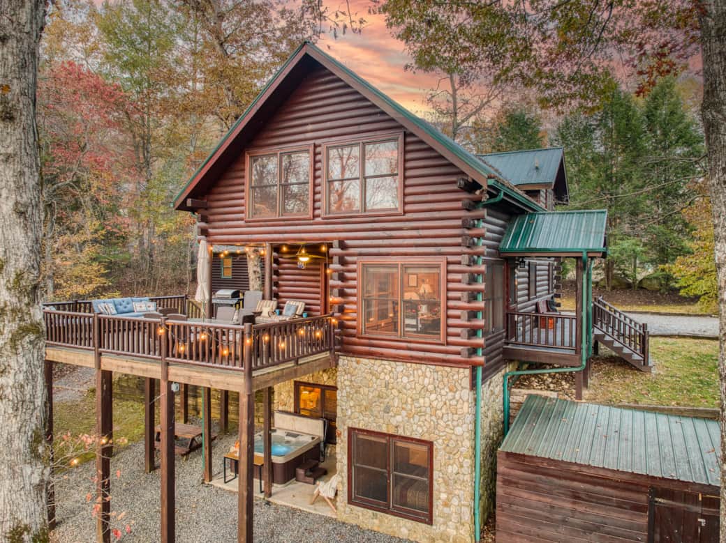 Outside view of cabin, deck, and hot tub Outside view of cabin, deck, and hot tub