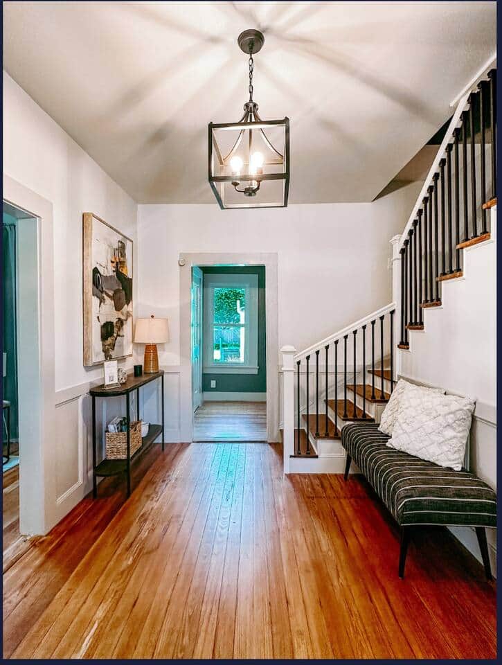 Entry foyer, living room is on the left, and straight ahead takes you to the bathroom and kitchen.