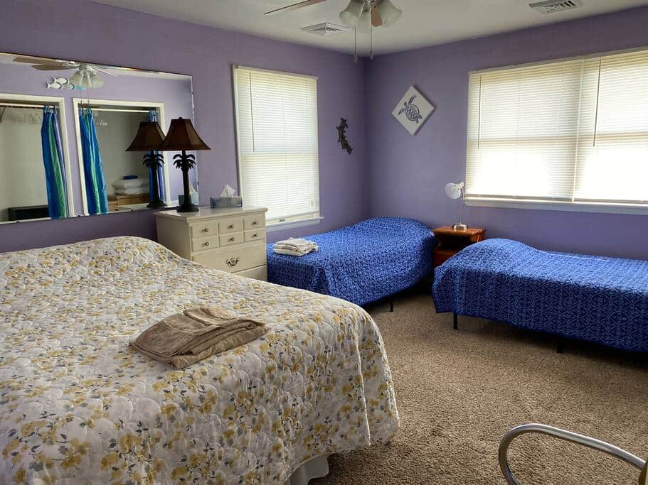 The Turtle room is on the 2nd floor, has 1 queen, 2 twins, TV and blackout curtains.