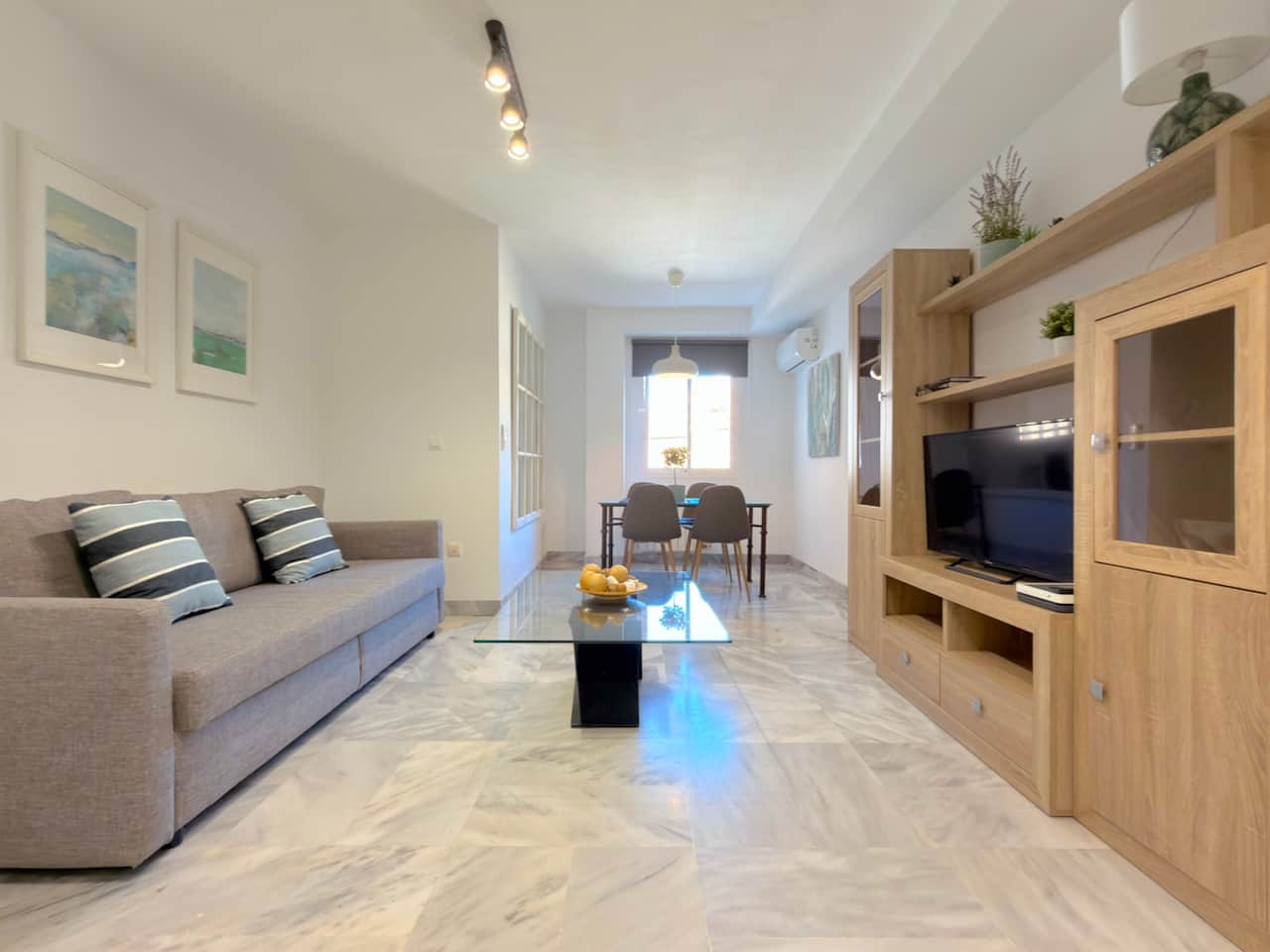 Living room ALCAZABA Málaga City Apartment HOMINGBOOK
