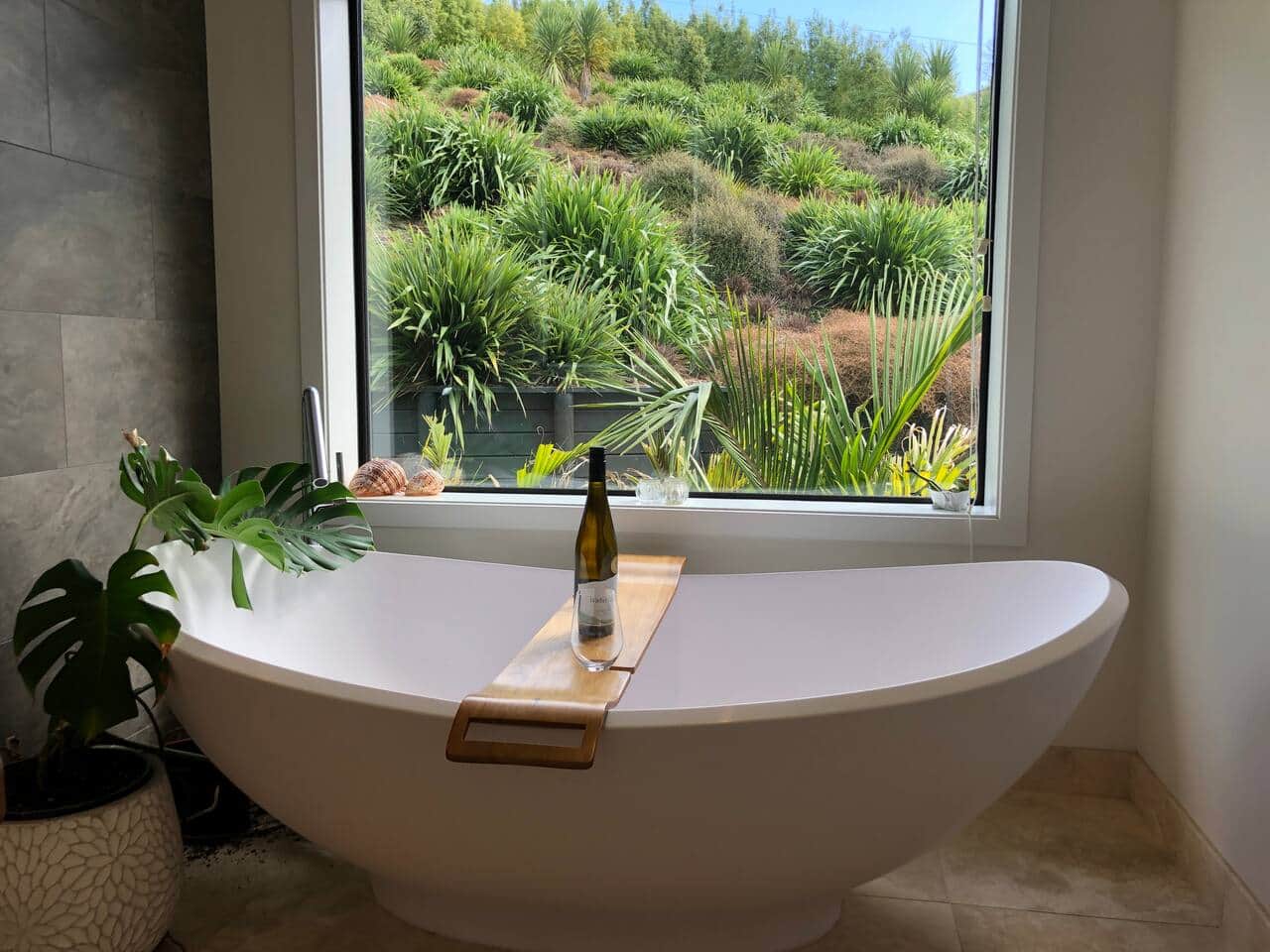 This bath is divine, deep and super comfortable, easily fits 1 either end