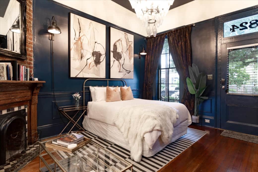 Inside your sanctuary where light floods the bedroom during the day on the color drenched interiors