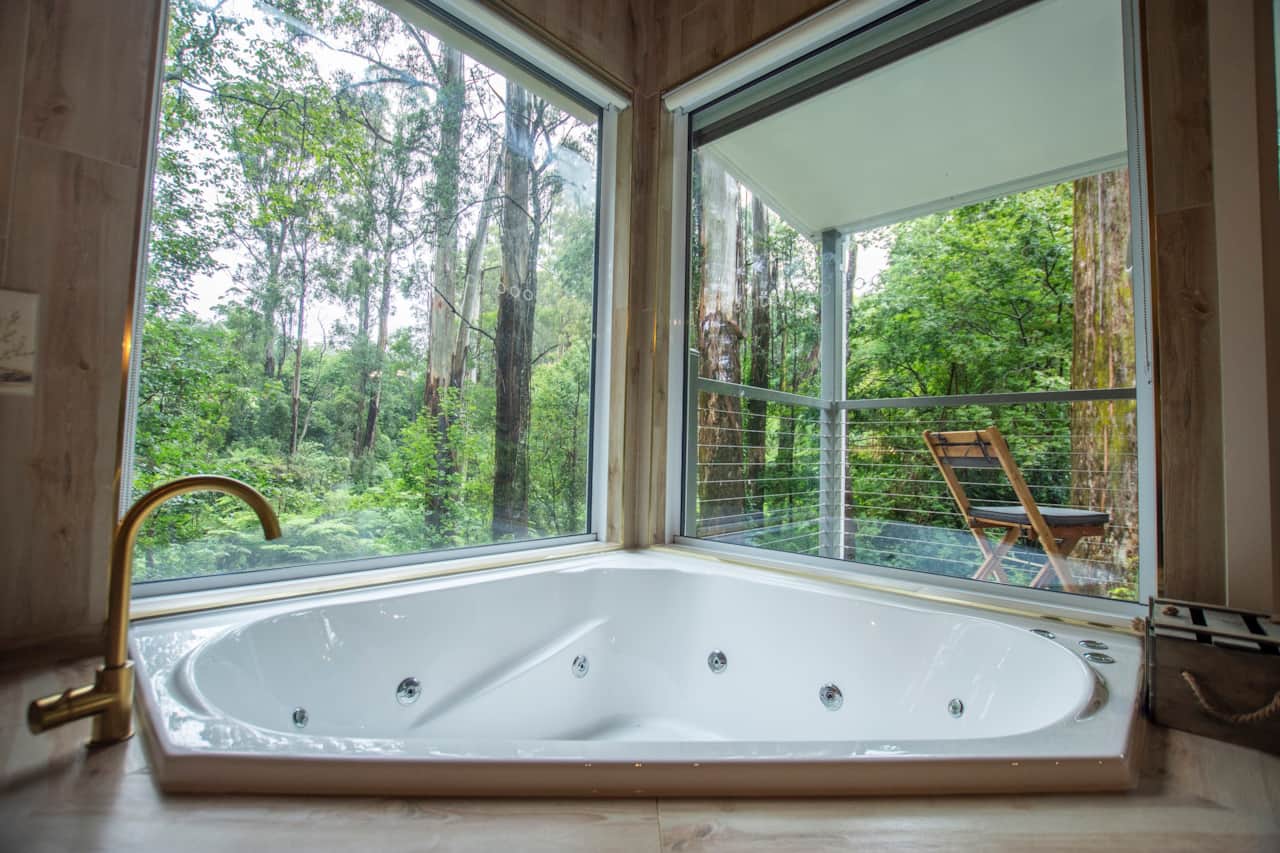 Lose yourself in the spa and overhead rain shower