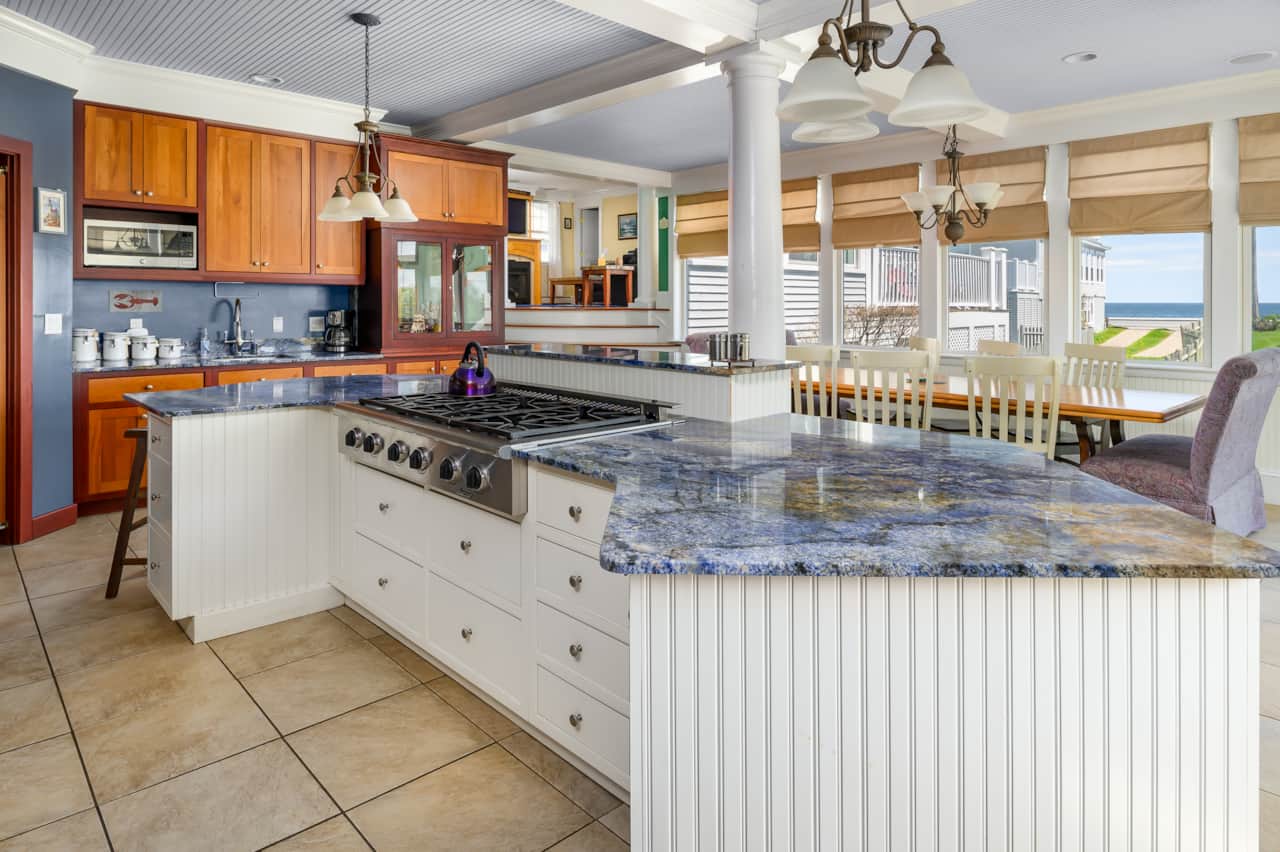 Chef's kitchen with blue Bahia granite countertops, custom trim, incredible appliances