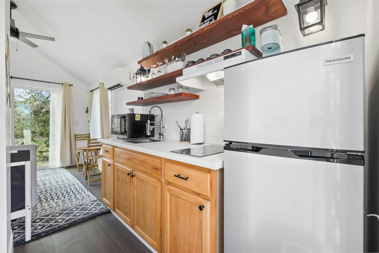 Kitchen with apartment sized fridge for your cooking needs