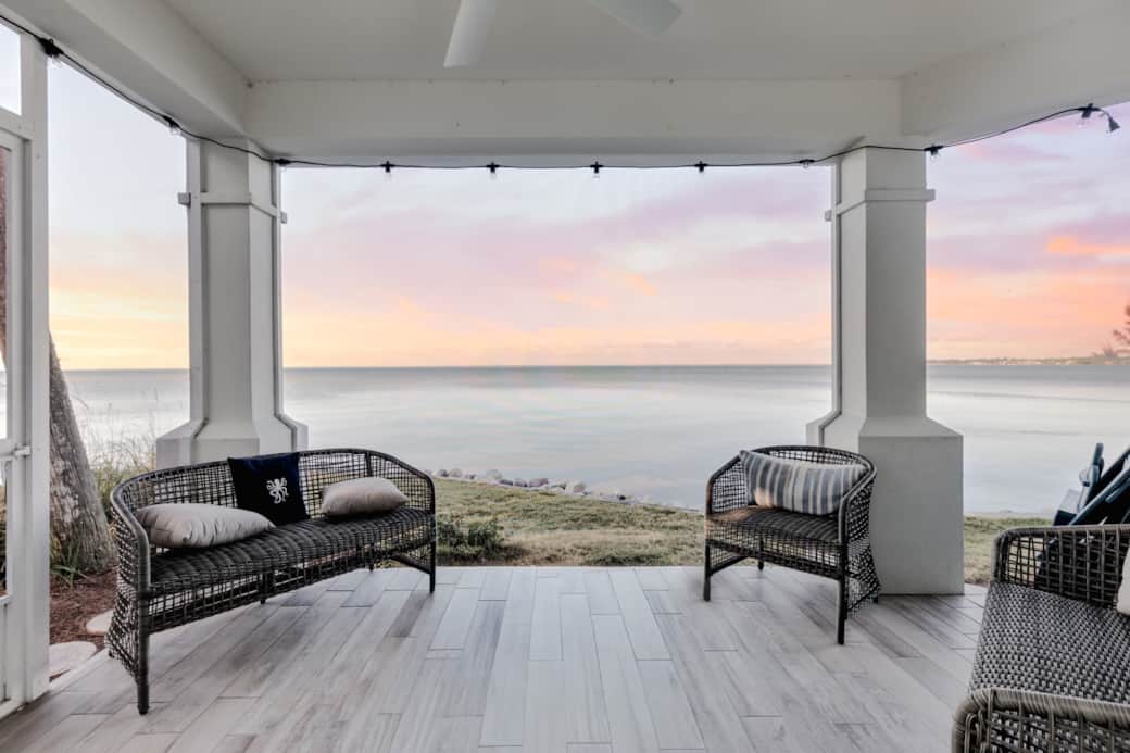 Enjoy relaxing bay views from the screen patio just off the living area. Enjoy relaxing bay views from the screen patio just off the living area.