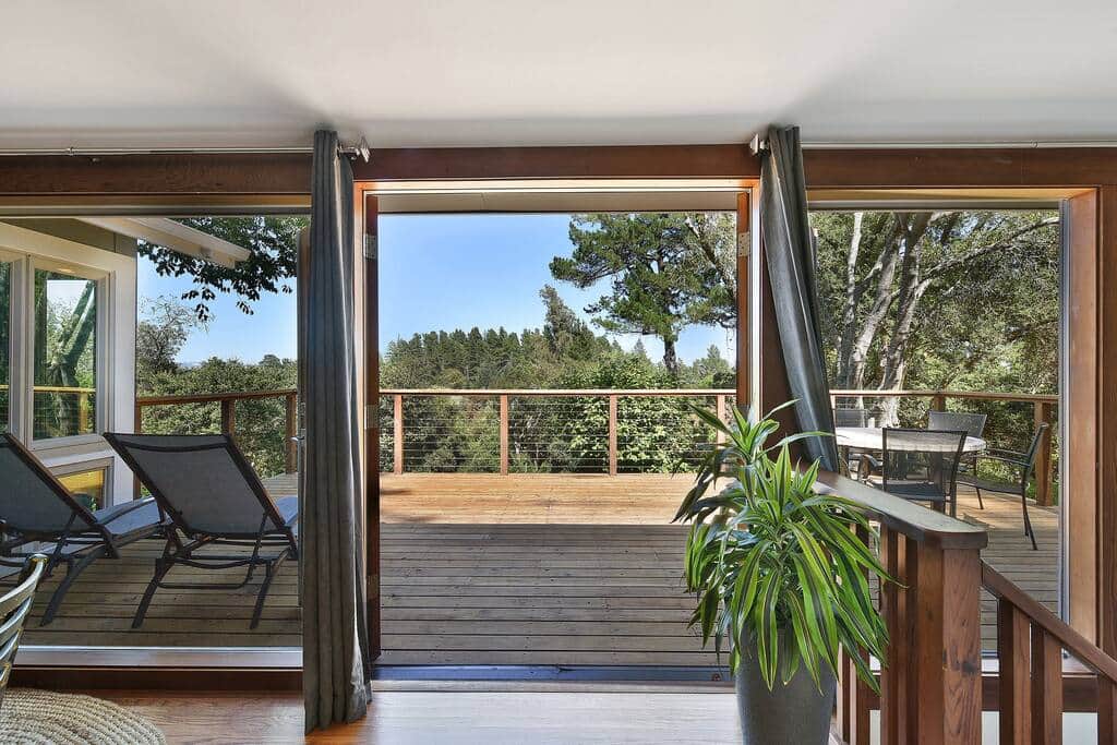 French doors open out to deck with beautiful views of the Sonoma Mountains