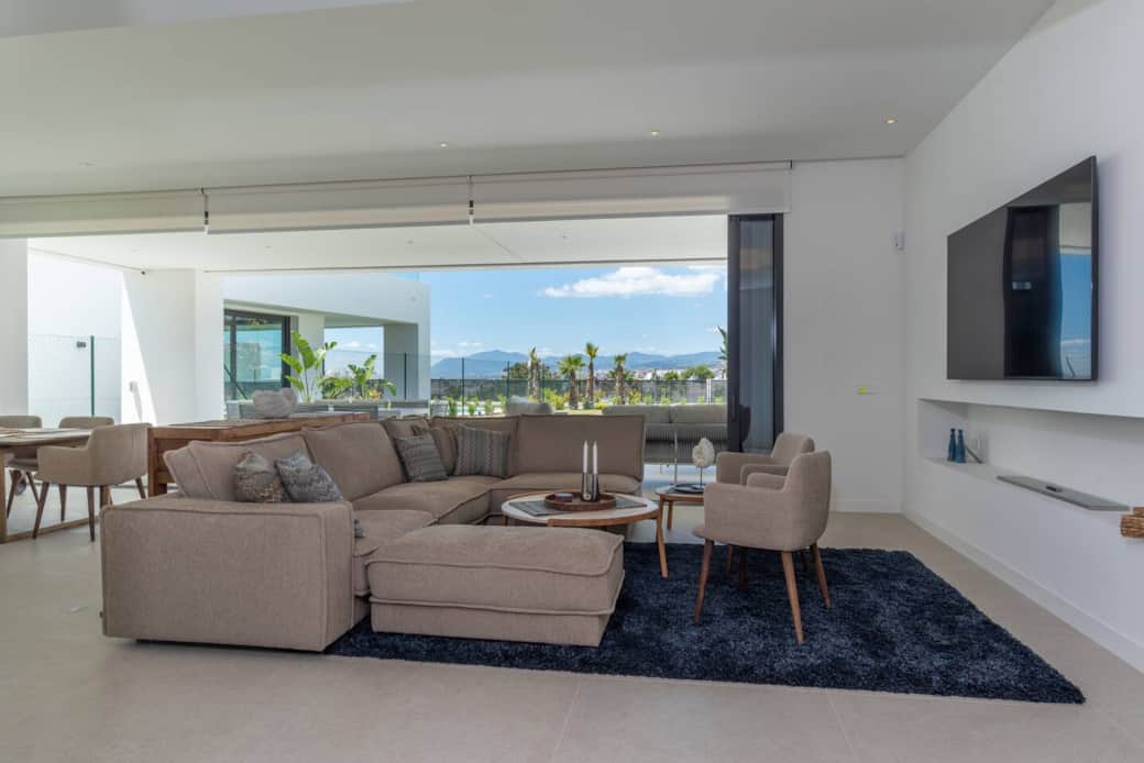 Walking into the open plan Lounge Dining room and Kitchen 