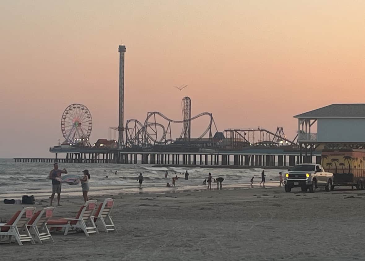 Pleasure Pier in Galveston at sunset during a girls getaway