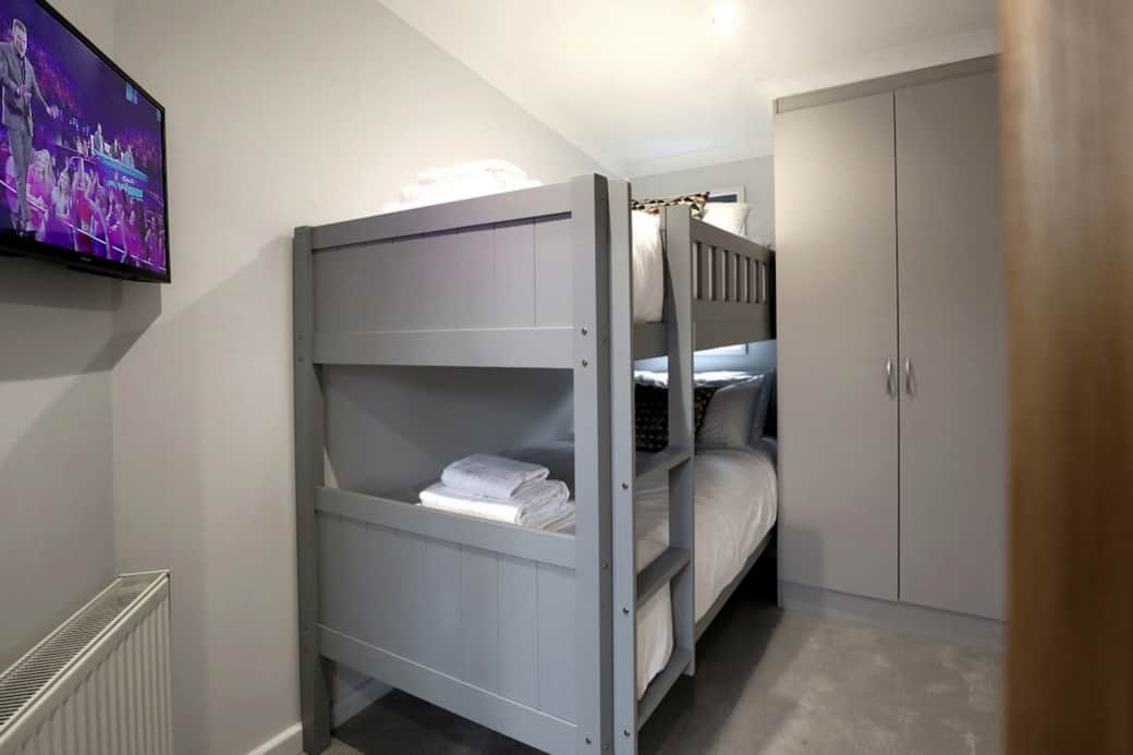 Dormitorio secundario con literas