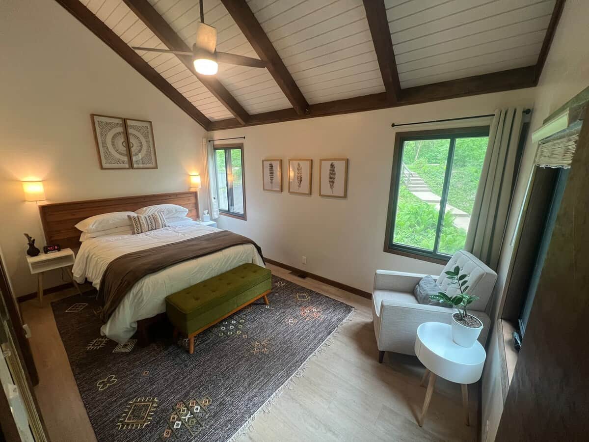 Bedroom 1 with seating area and views