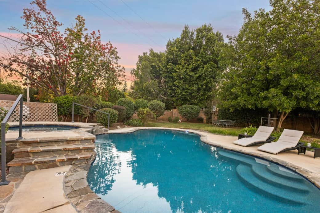 The pool is just steps from the patio, making it easy to go back and forth for snacks and drinks.