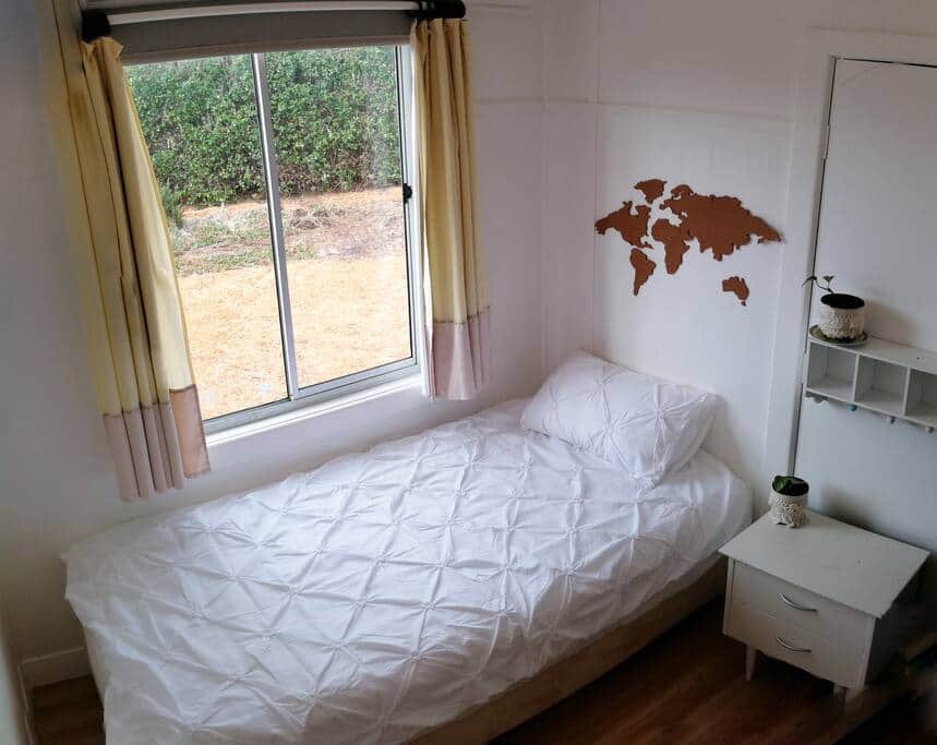 Room with a single bed.