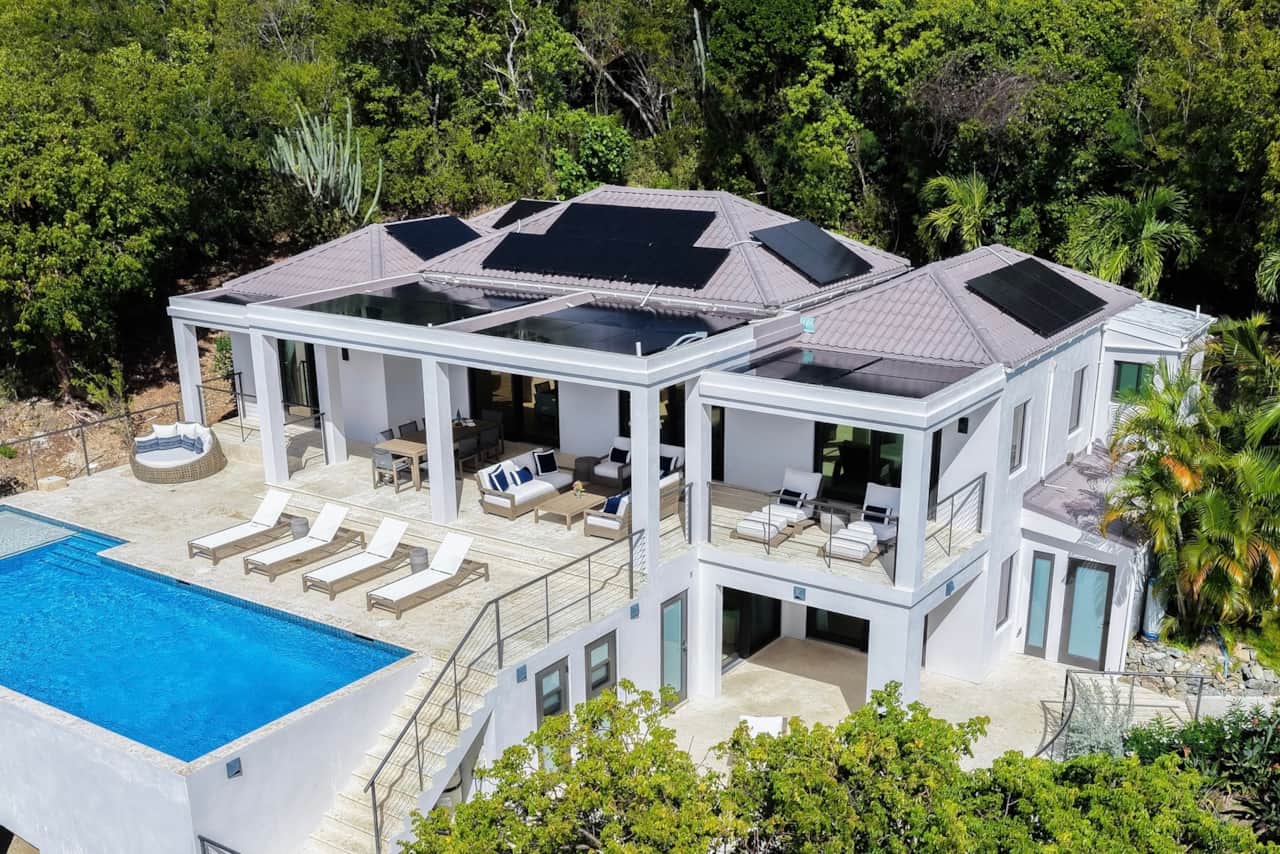 Full villa drone photo that shows upper and lower level