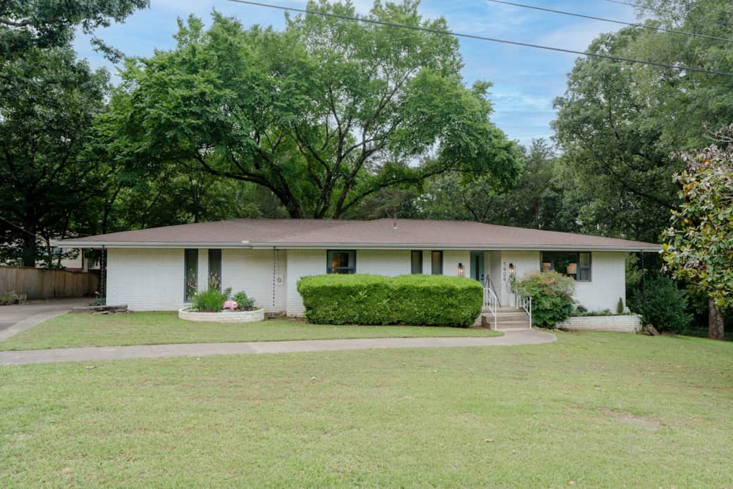 Welcome to your Greers Ferry getaway where mid-century charm meets modern comfort.