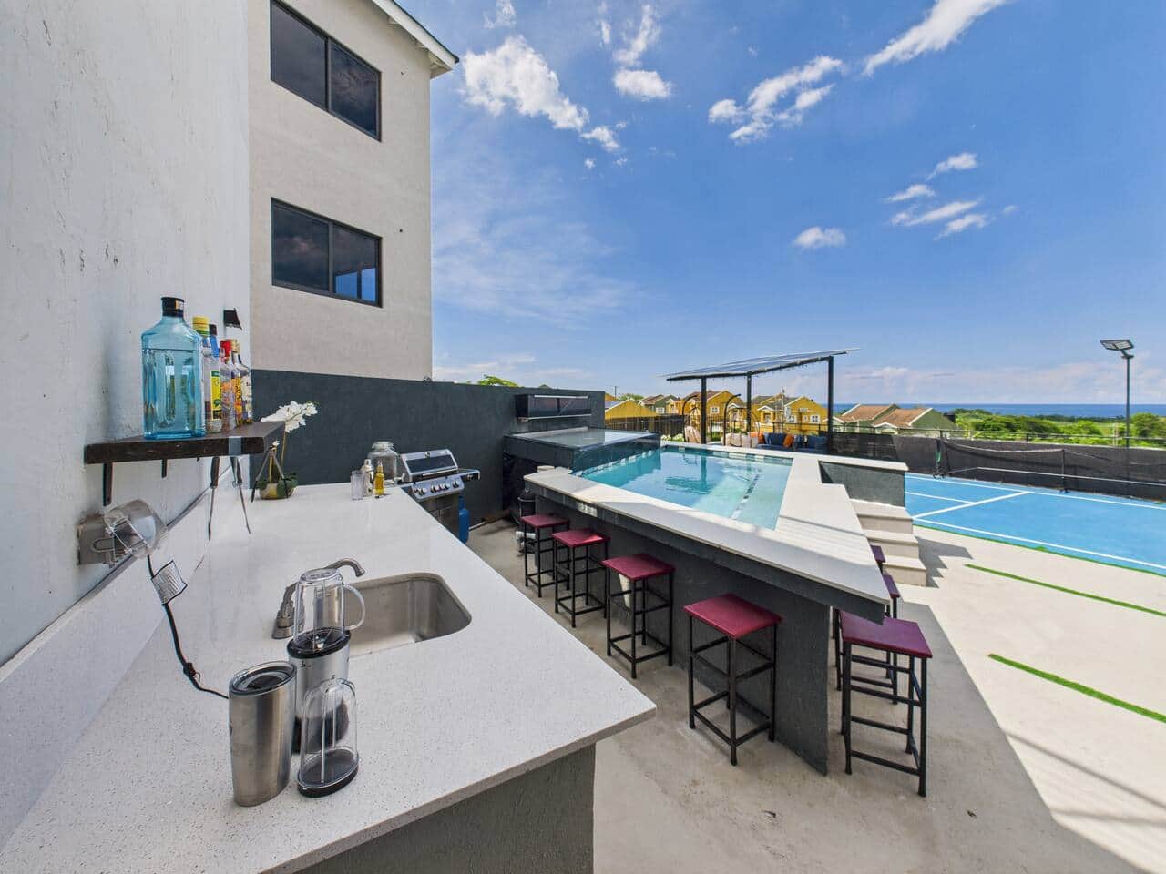 Enjoy our outdoor retreat with comfortable seating, open skies, and panoramic hillside  and ocean views 