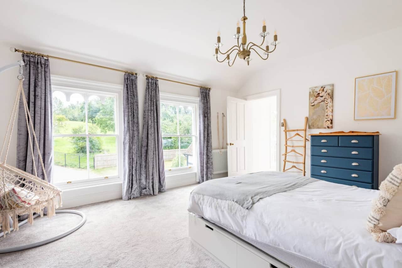 A light-filled bedroom in the Georgian main house