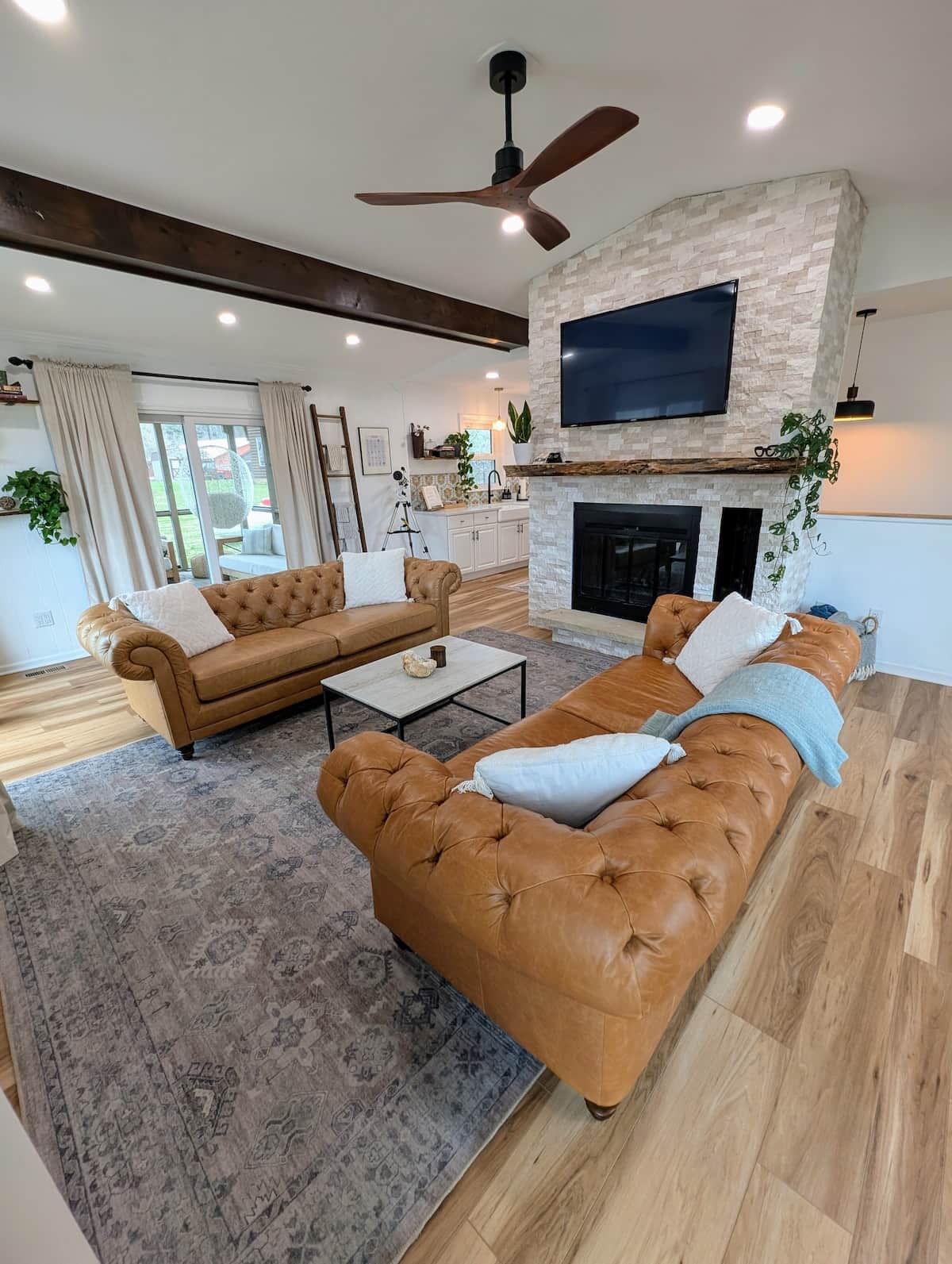 The living room is filled with beautiful natural light & offers a direct view of Lake Logan. Curl up with a cup of coffee, enjoy the peaceful scenery, or enjoy the fire. It’s the perfect space to slow down, get cozy, & take in the beauty of the lake.