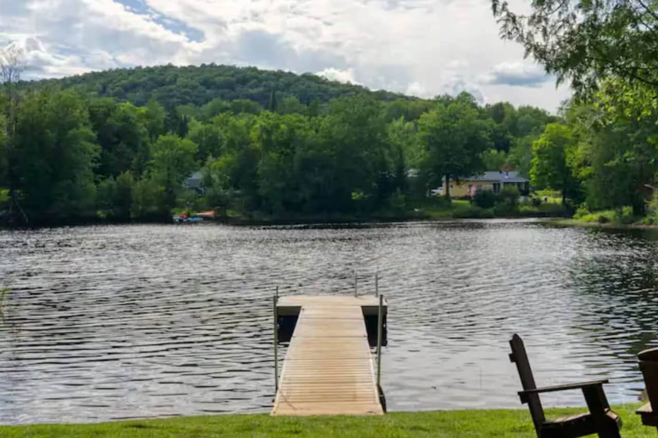 Private waterfront access with kayaks and a peaceful dock for your morning coffee by the lake