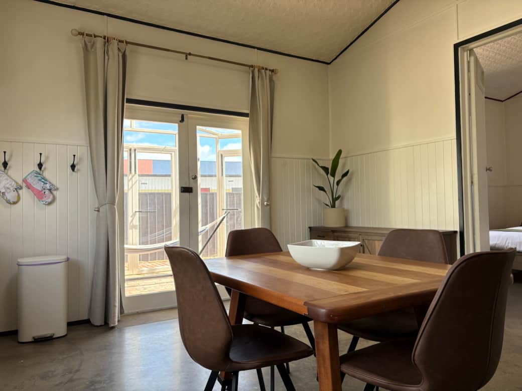 Choose to dine in the kitchen at the cosy smaller table, or gather around the larger dining table in