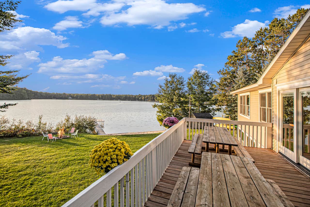 Lakeview deck with picnic tables so everyone eats outside together