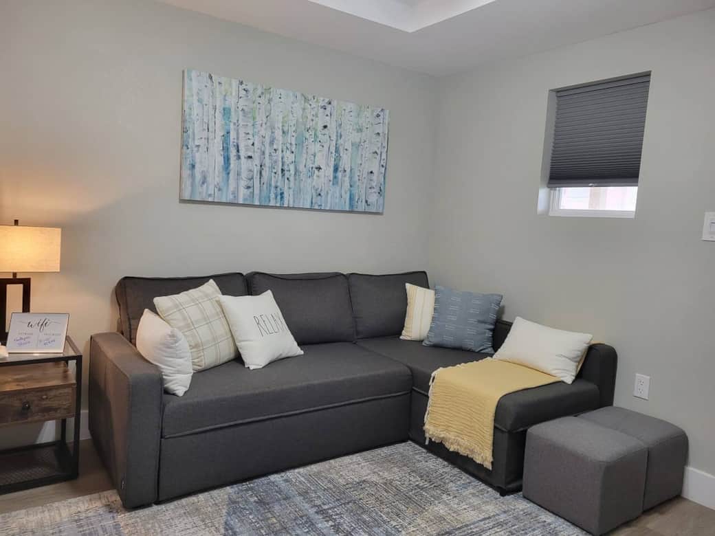 Spacious living area with convertible sofa sleeper.