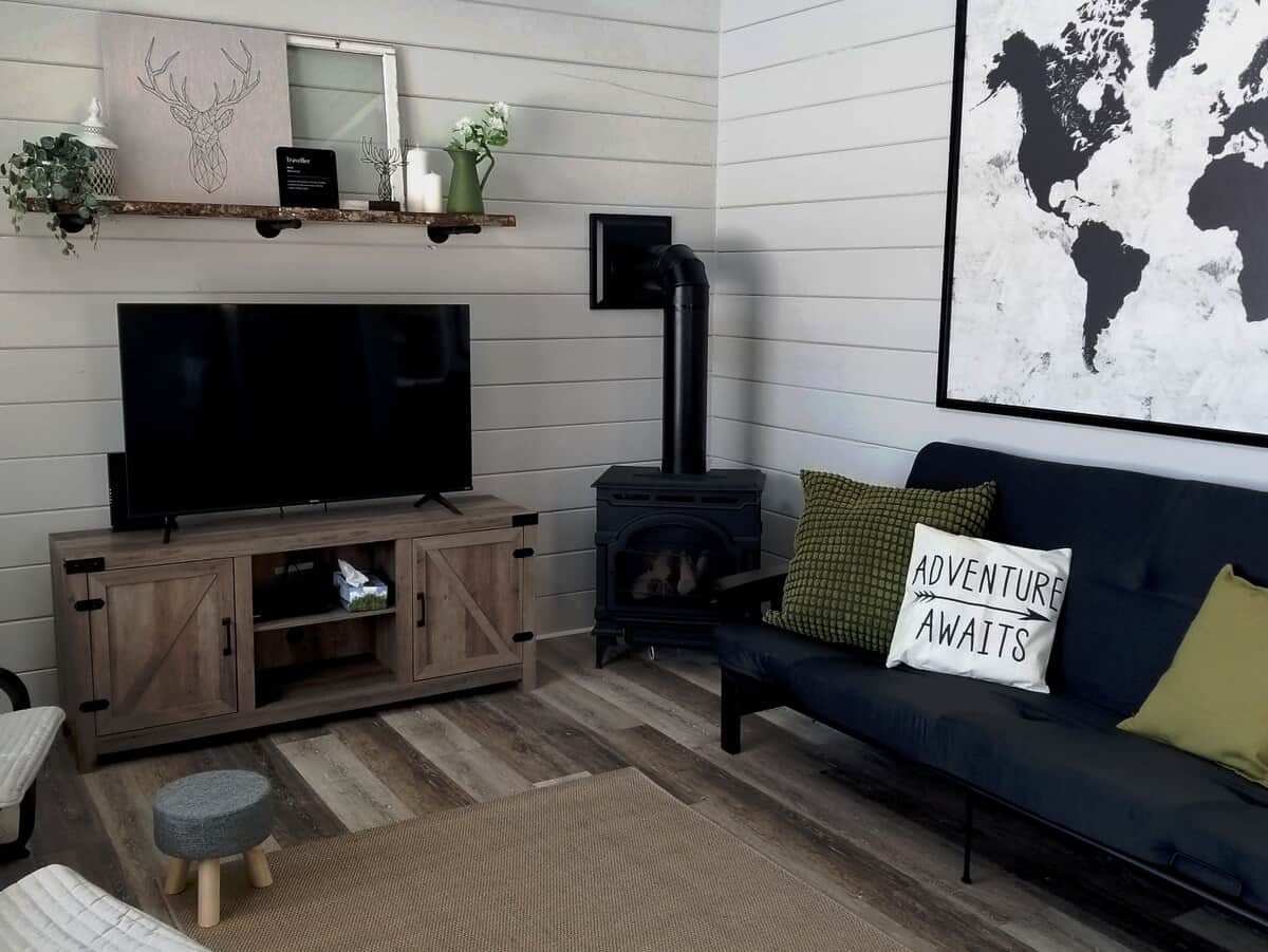 Relax in your spacious living room with a beautiful view of the mountains. 