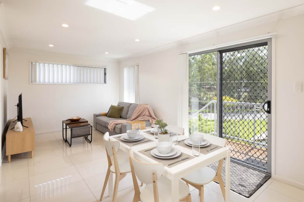 Dining Area: Integrated dining area within open living layout 