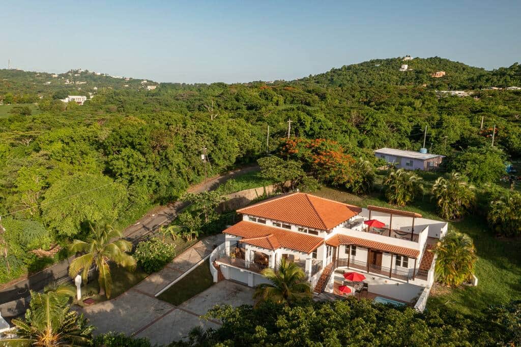 Aerial view of the home. The home is located in a quieter area. Aerial view of the home. The home is located in a quieter area.