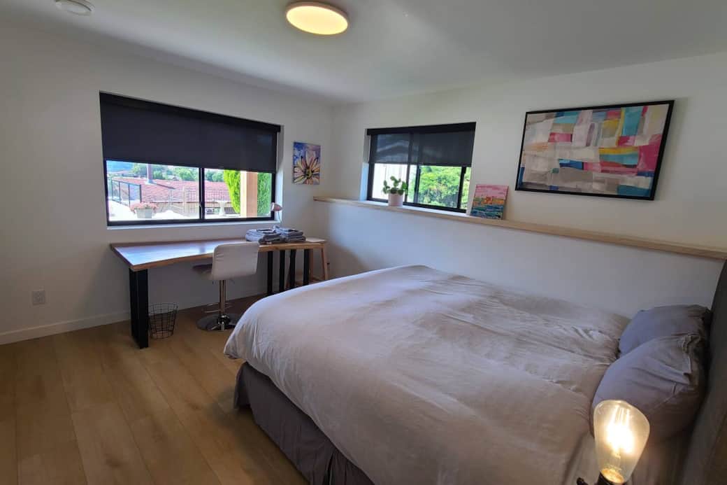 The fifth bedroom in the house and located next to the second living room. The bed is a king size.