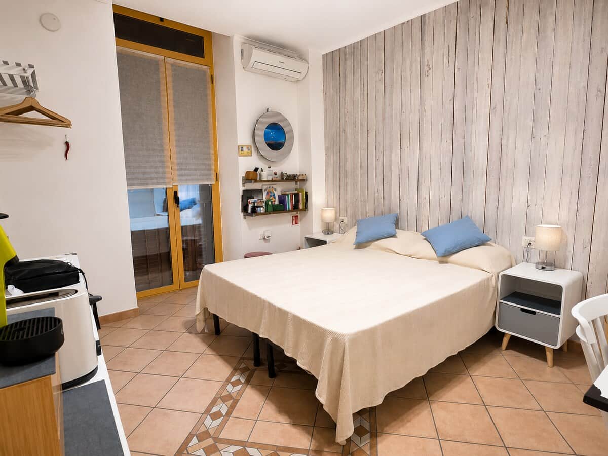 Bright bedroom with a premium double bed for a relaxing and restful stay.