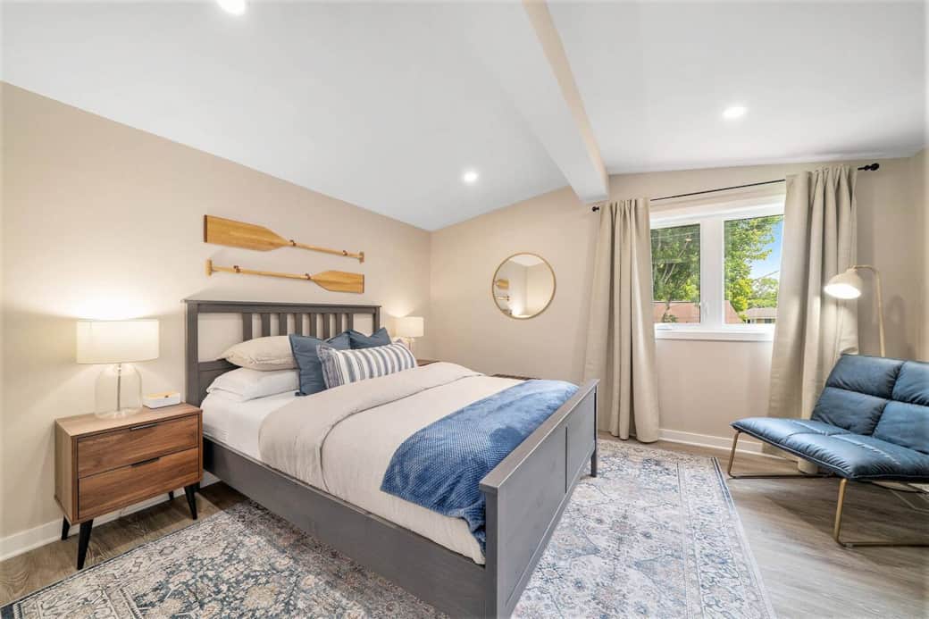 This calm, coastal-inspired queen-sized bed is perfect for unwinding after a busy work day. This calm, coastal-inspired queen-sized bed is perfect for unwinding after a busy work day.