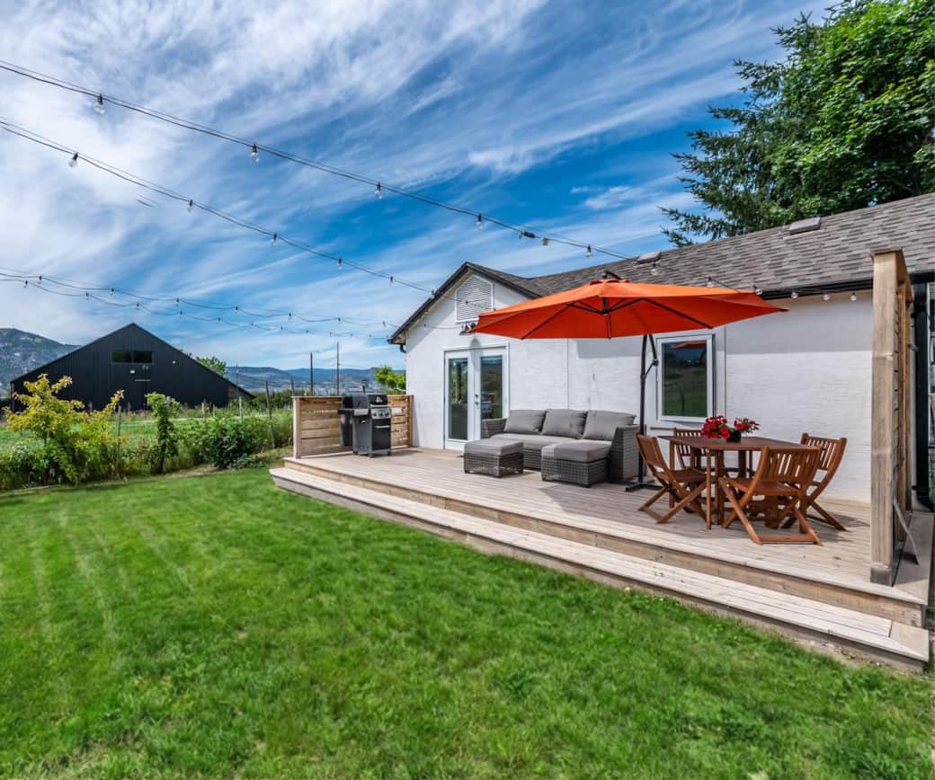 Backyard and deck. Abandoned Rail Brewing Co in the background