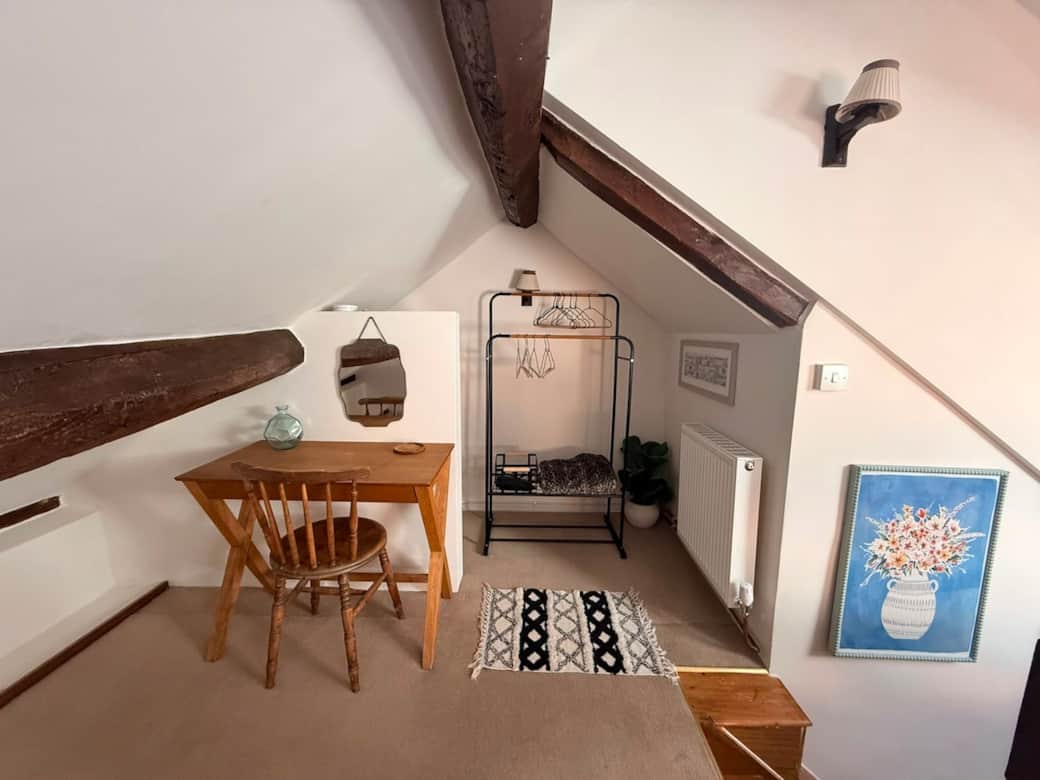 Workspace and clothes rail