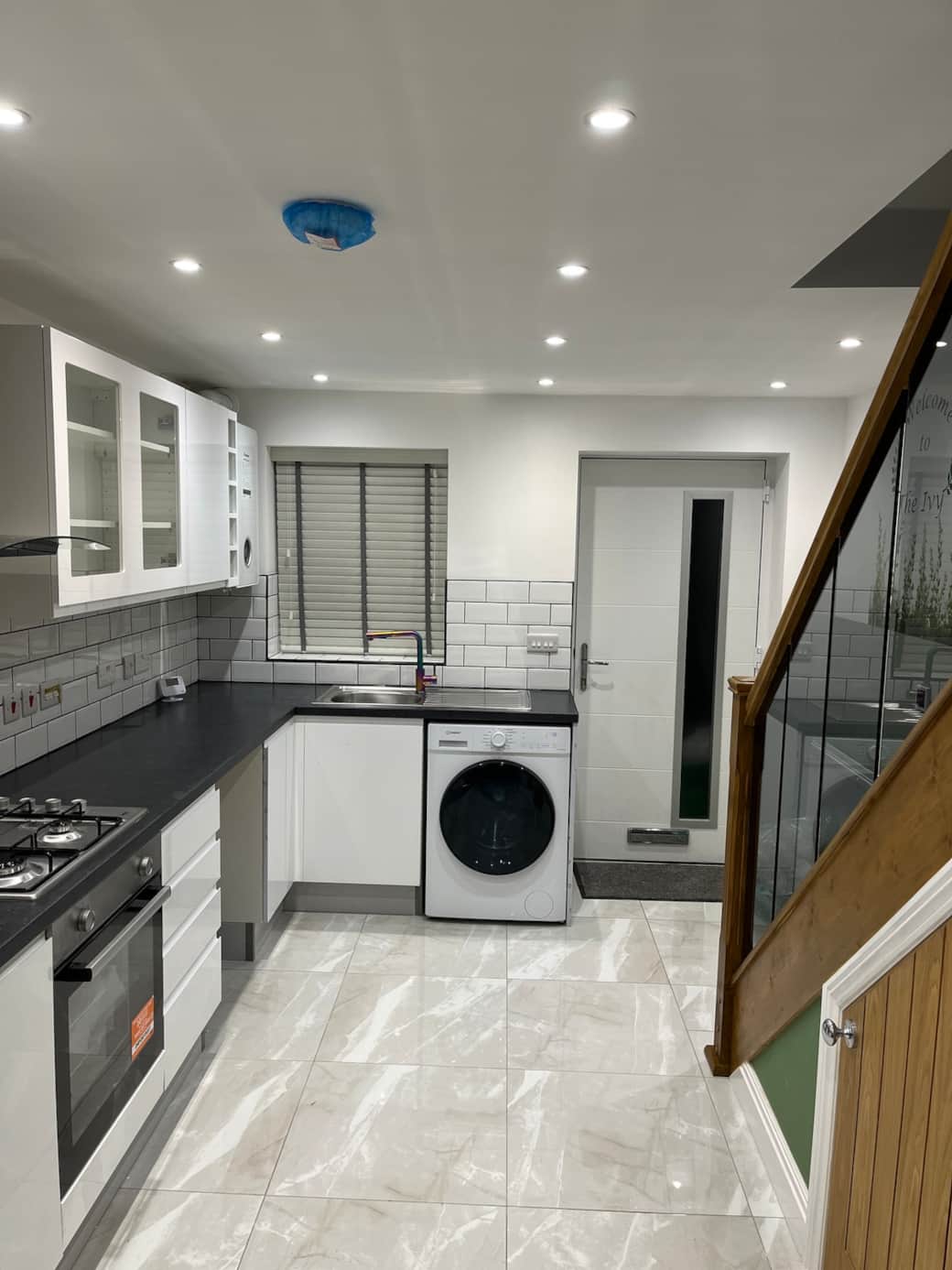 Kitchen with toaster , microwave, kettle. Underfloor heating in kitchen area