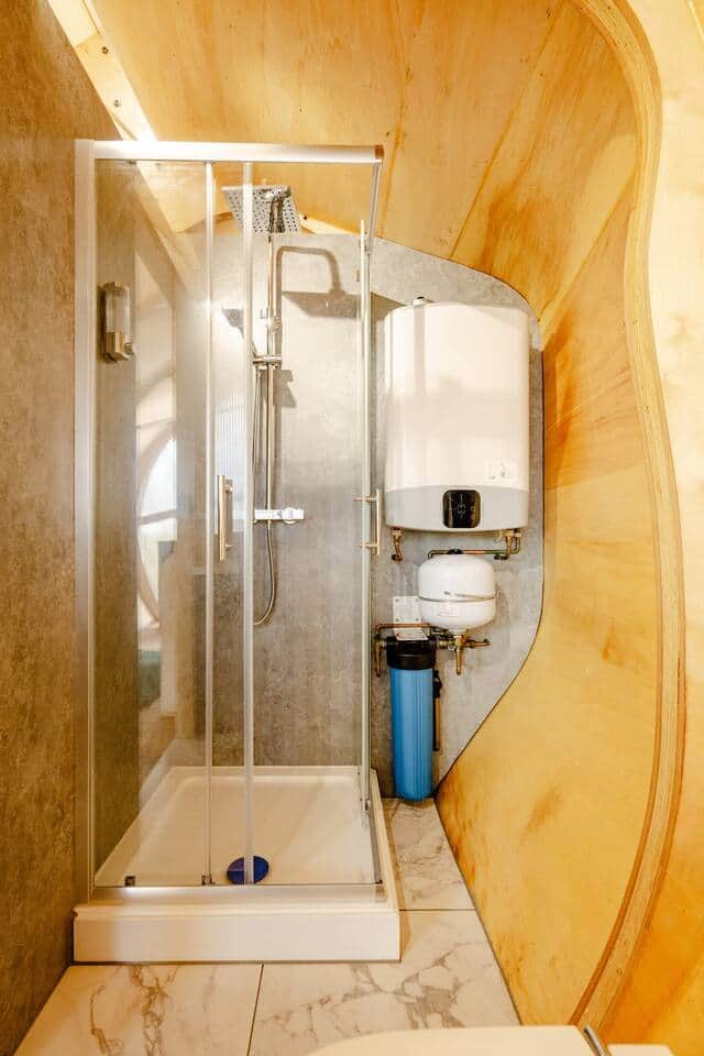 Bathroom with Curved Walls - warm water
Warm water from Electric boiler with a heated shower