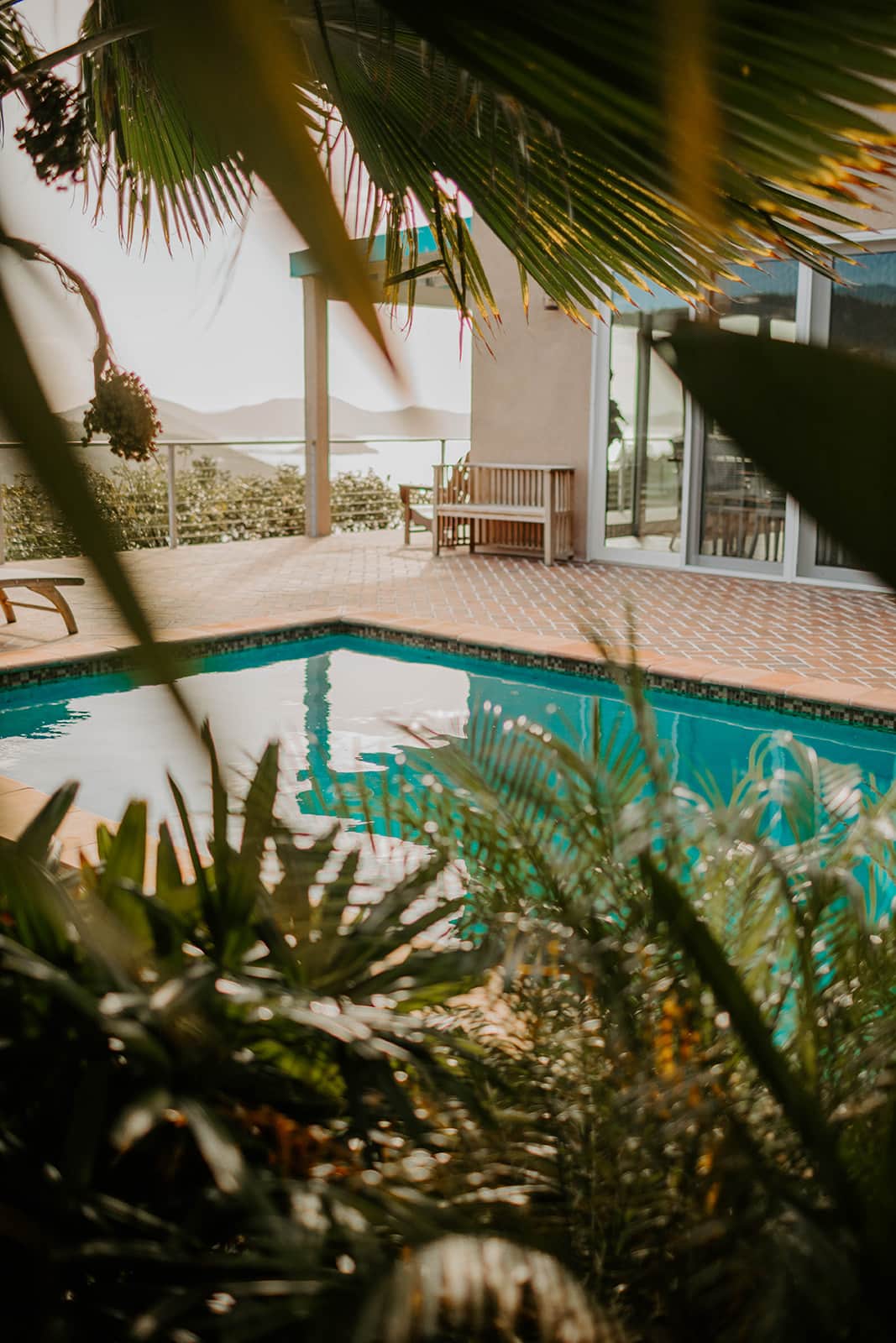 The view from the garden, overlooking the pool and into the harbor