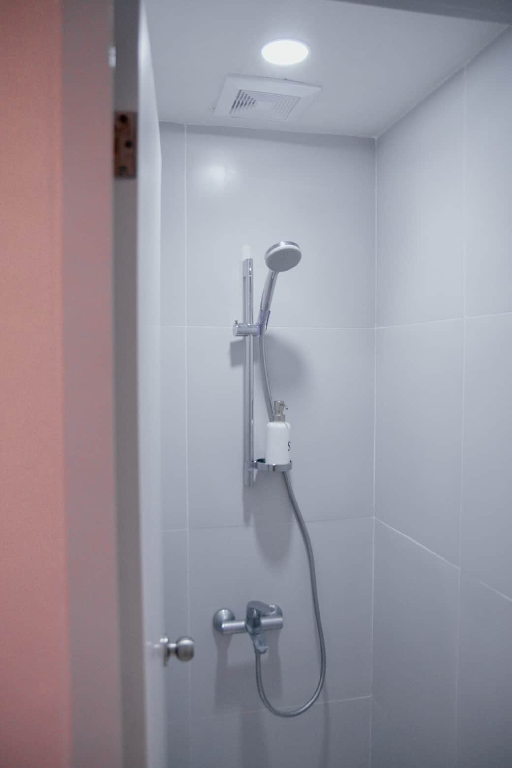Clean private bathroom with hot & cold shower and fresh towels provided.