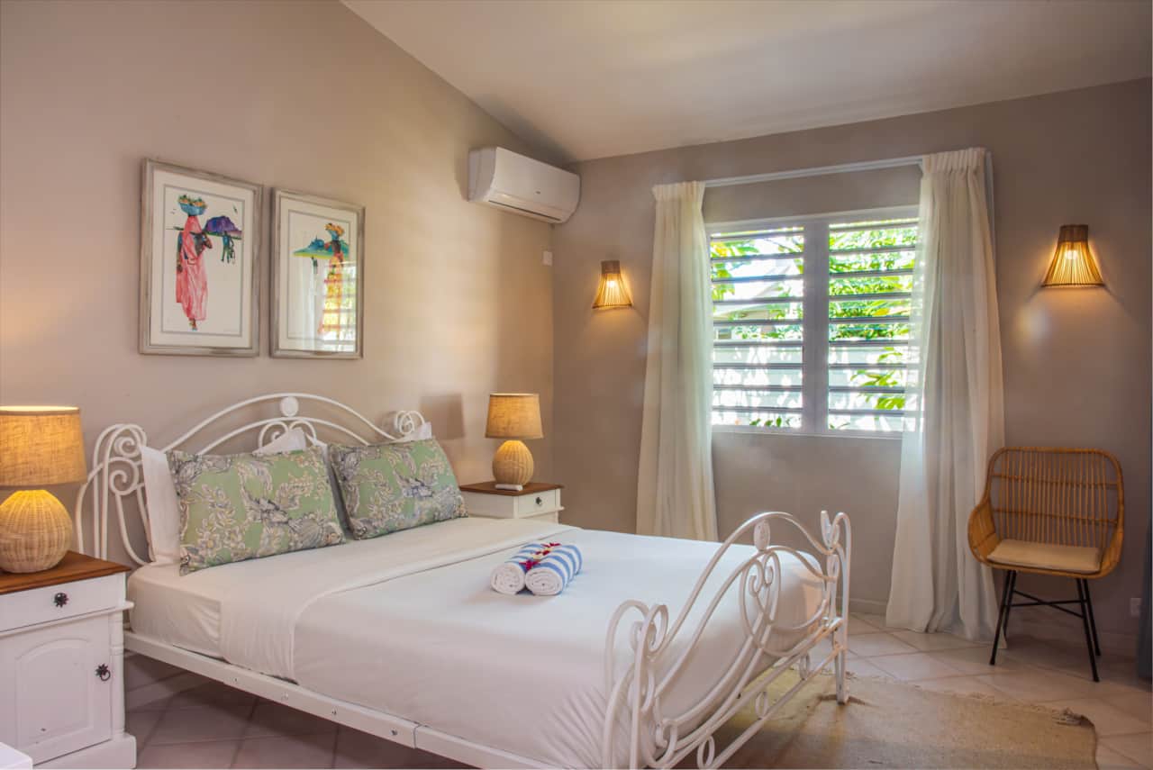 Bright and inviting Bedroom featuring beautiful natural light and equipped with air conditioning