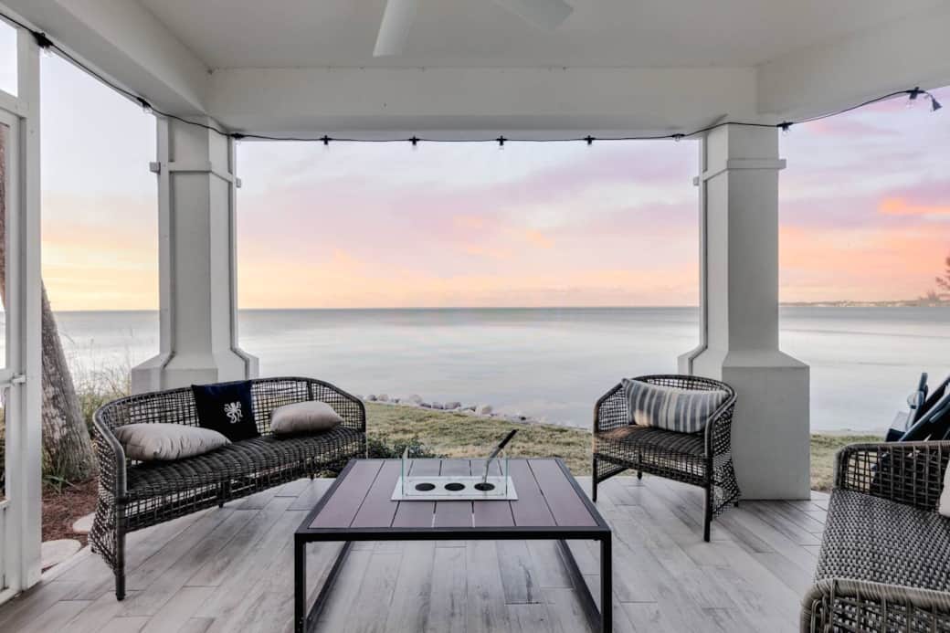 Enjoy relaxing bay views from the screen patio just off the living area. Enjoy relaxing bay views from the screen patio just off the living area.