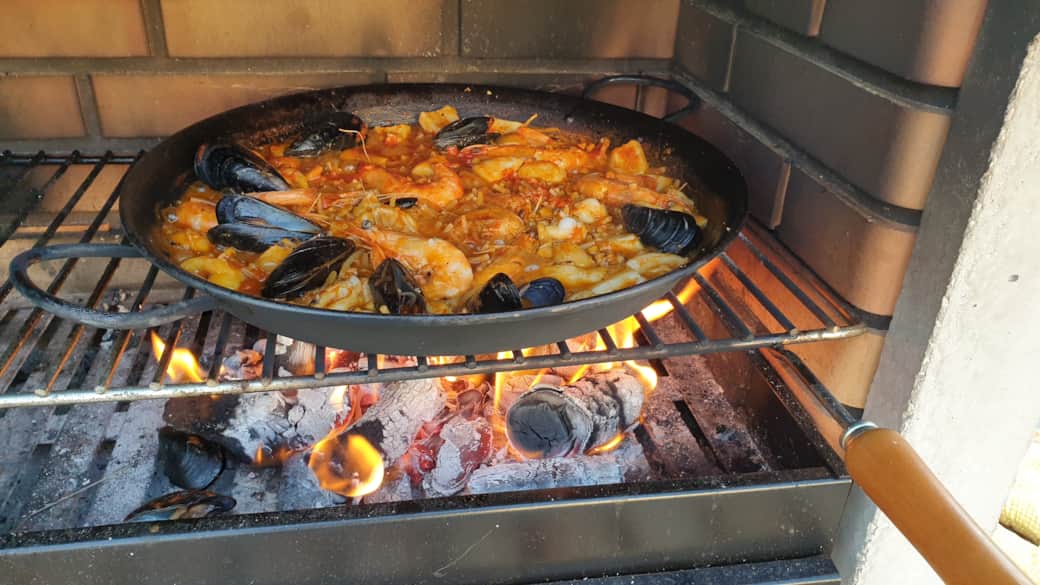 Paella cooked over wood