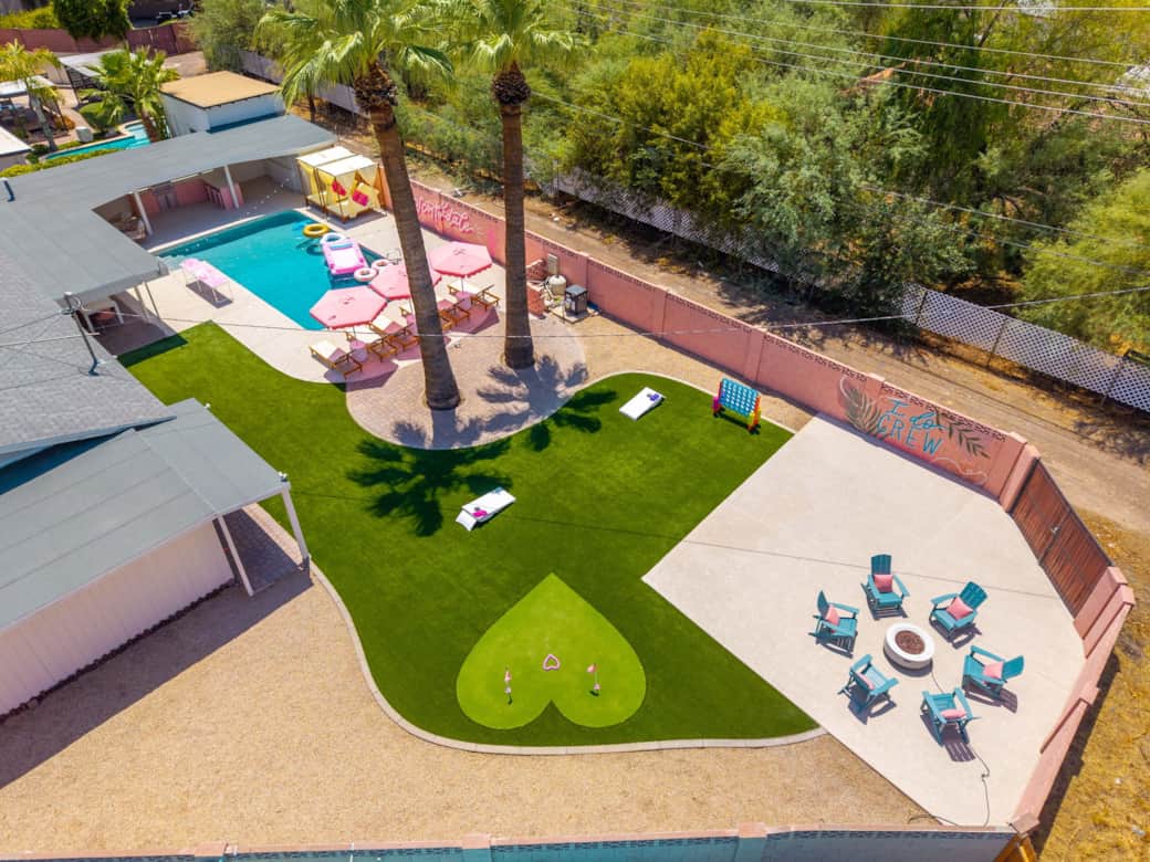Massive resort style backyard - Private pool, cabanas, mini golf, fire pit and two custom murals