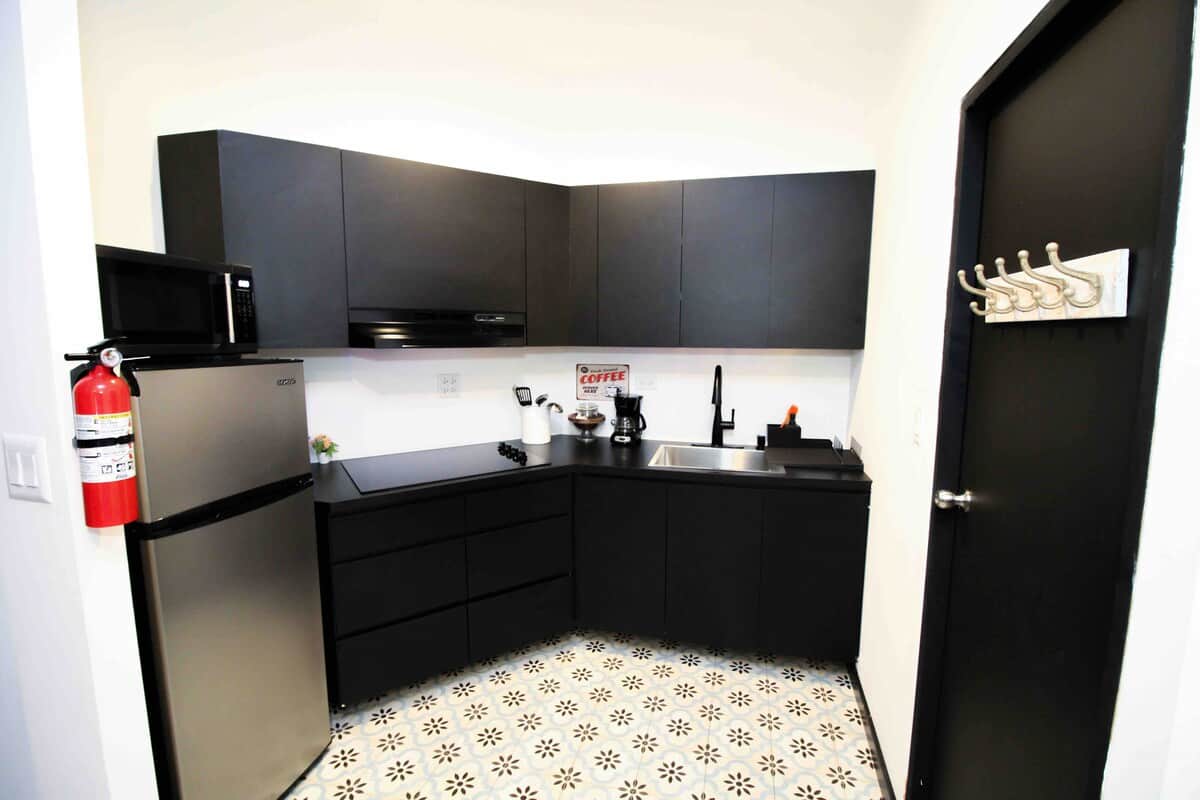 Our apartments feature a medium-sized refrigerator with ample space for your short-term stay. Additionally, we provide complimentary water.